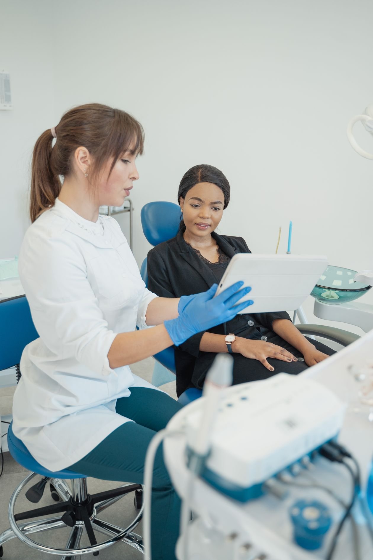 Dentist discussing treatment with a patient