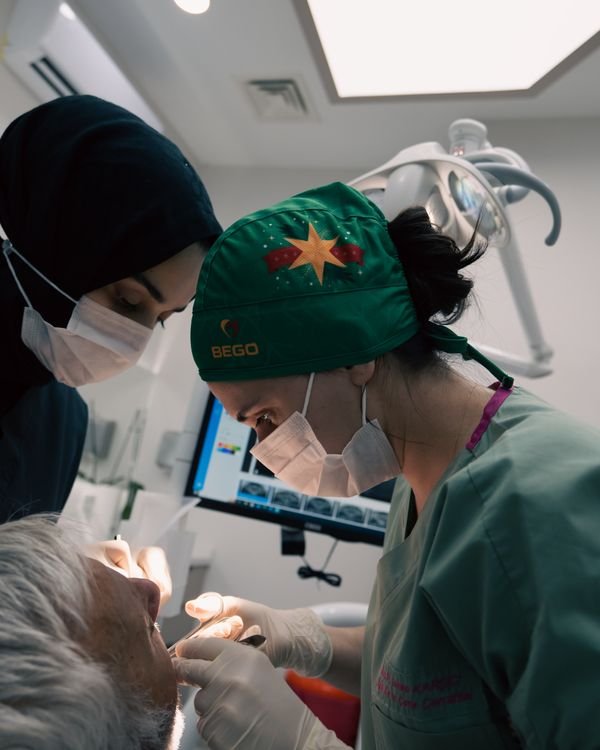 Dental professionals providing patient care in a modern clinic